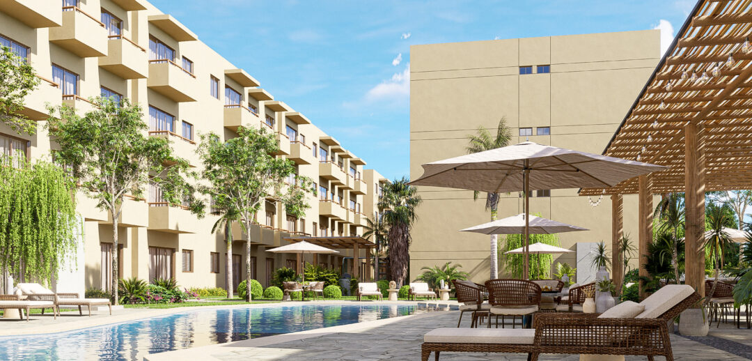 Vista lateral de los departamentos y su área de alberca de Oceanna Mazatlán, un exclusivo desarrollo de departamentos frente al mar en Mazatlán.