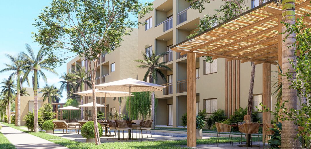 Vista del área común detrás edificios de Oceanna Mazatlán, un exclusivo desarrollo de departamentos frente al mar en Mazatlán.