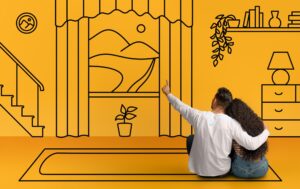 Pareja joven realiza la revisión de boceto para la decoración del hogar sin dejar escapar ningun detalle