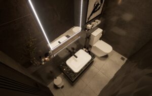 Un-bano-con-un-gran-espejo-iluminado-y-un-lavabo-con-inodoro